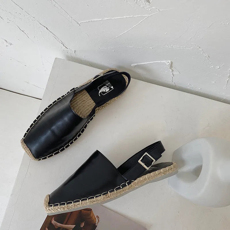 Women's beige retro fisherman flat sandals with animal pattern on soft canvas upper.