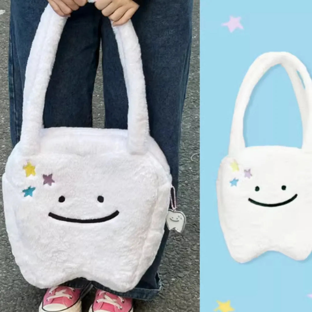 White plush shoulder tote bag with cute teeth design and zipper closure