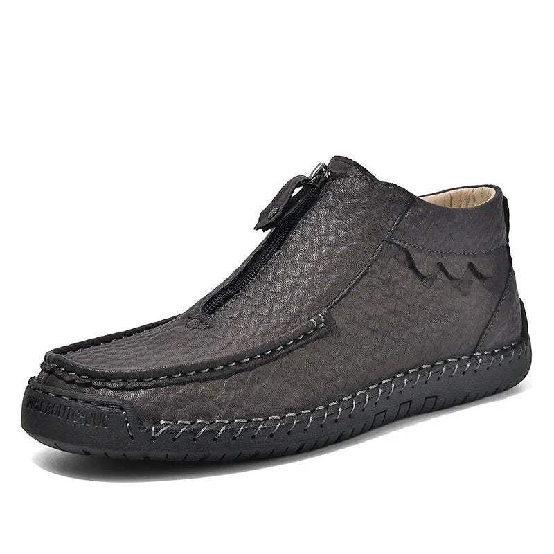 Men's black slip-on leather loafers with round toe and flat rubber sole
