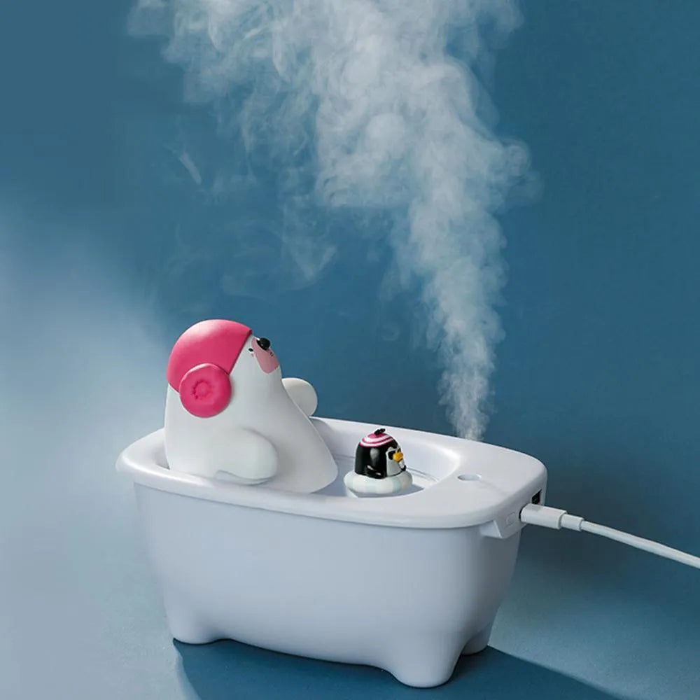White USB air humidifier with 550ml tank and dual mist modes on a desk