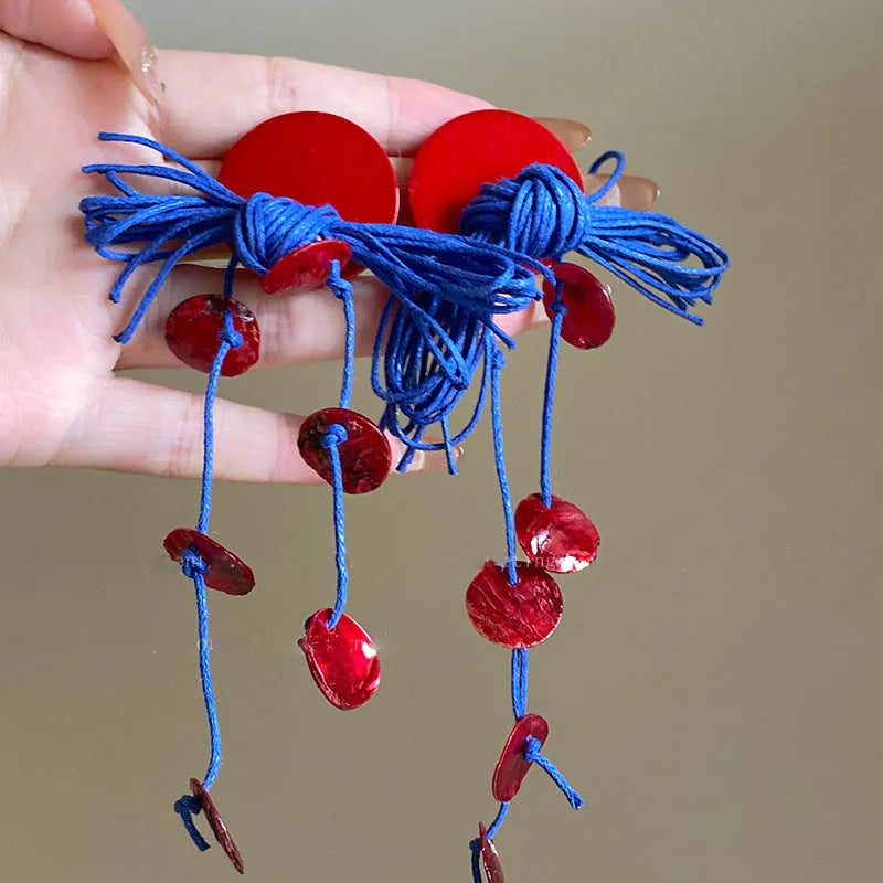 Geometric cloth women's earrings in 30 Silver Needle colour with blue resin flower detailing