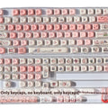 Close up of pink fragrant pig PBT keycap with MOA height profile showing five-sided sublimation design