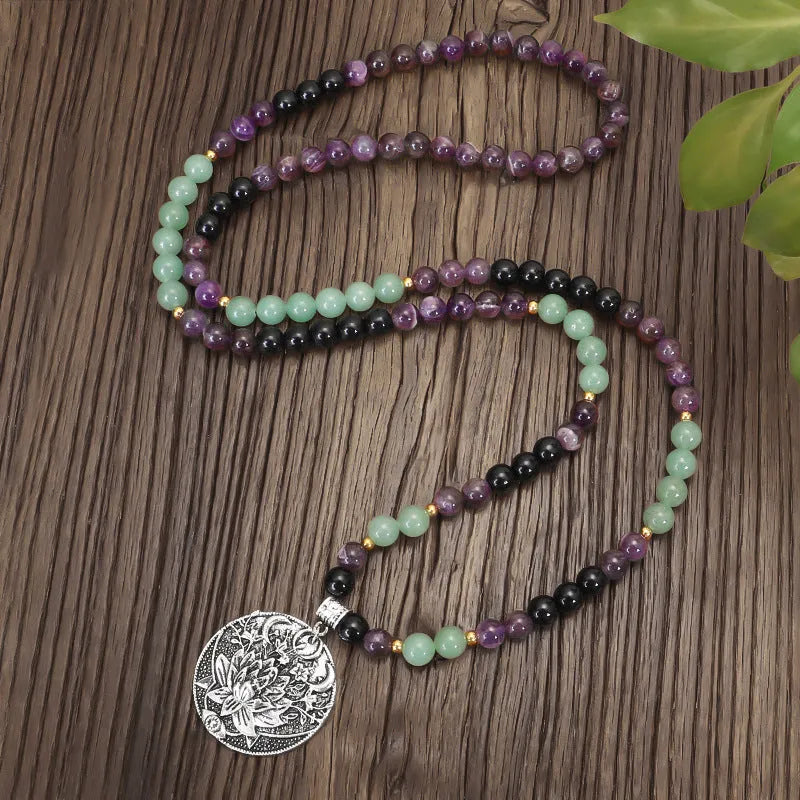 Handmade stone bead yoga necklace with geometric alloy lotus pendant and matching bracelet.