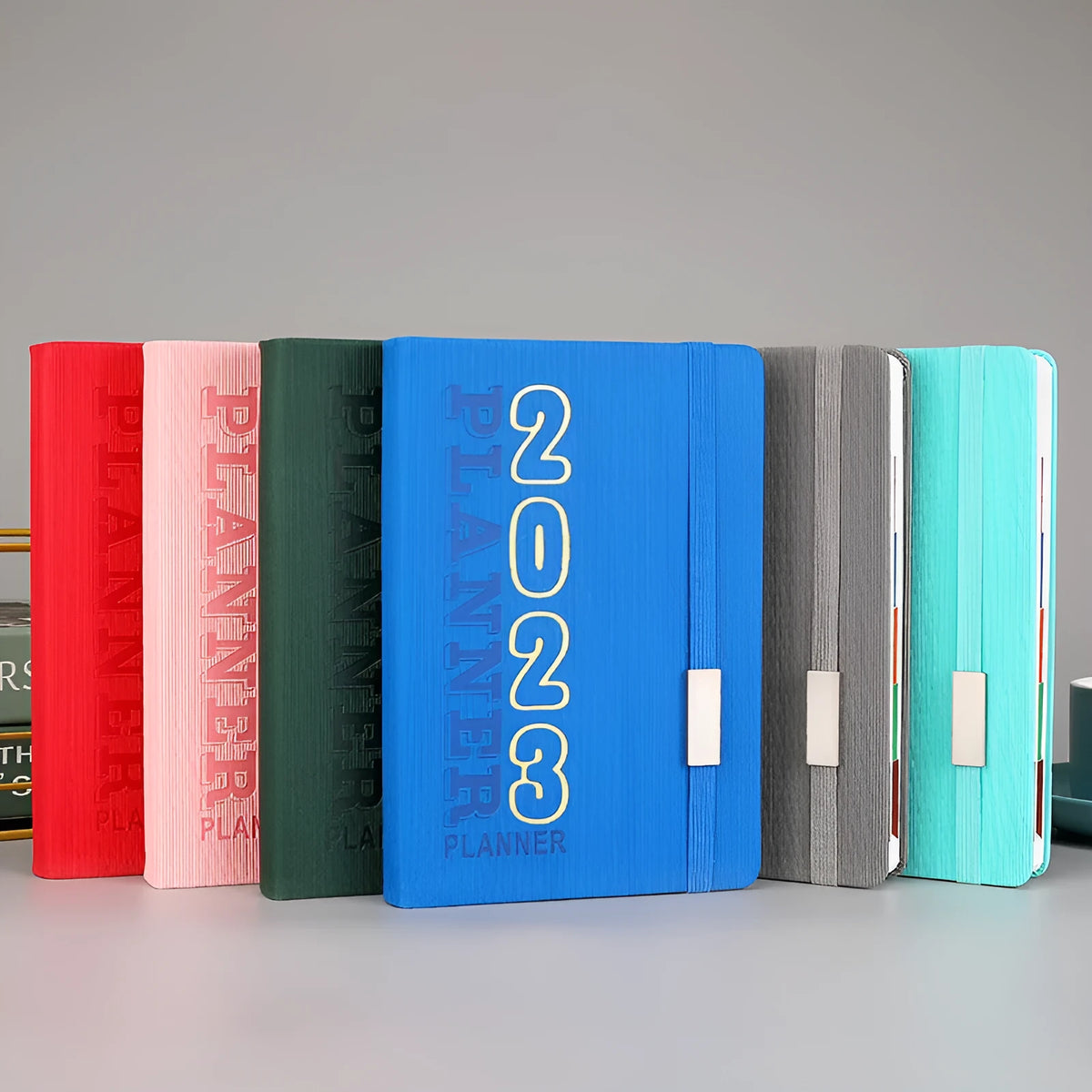 Wire-o bound student almanac calendar with imitation leather cover, open to show dated pages and 80g Daolin paper.