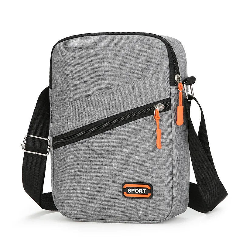 Oxford cloth crossbody commuter bag in solid colour with contrast design