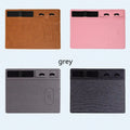 Wireless charging mouse pad with phone holder in black PU material showing 10W charging zone and USB cable
