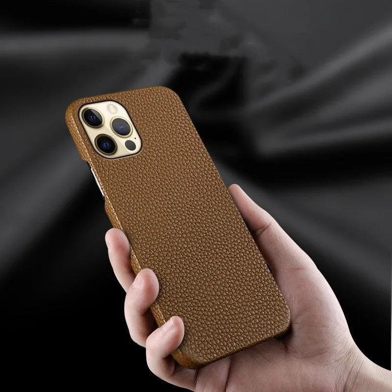 Genuine leather protective case for iPhone in simple half-break style on a table.