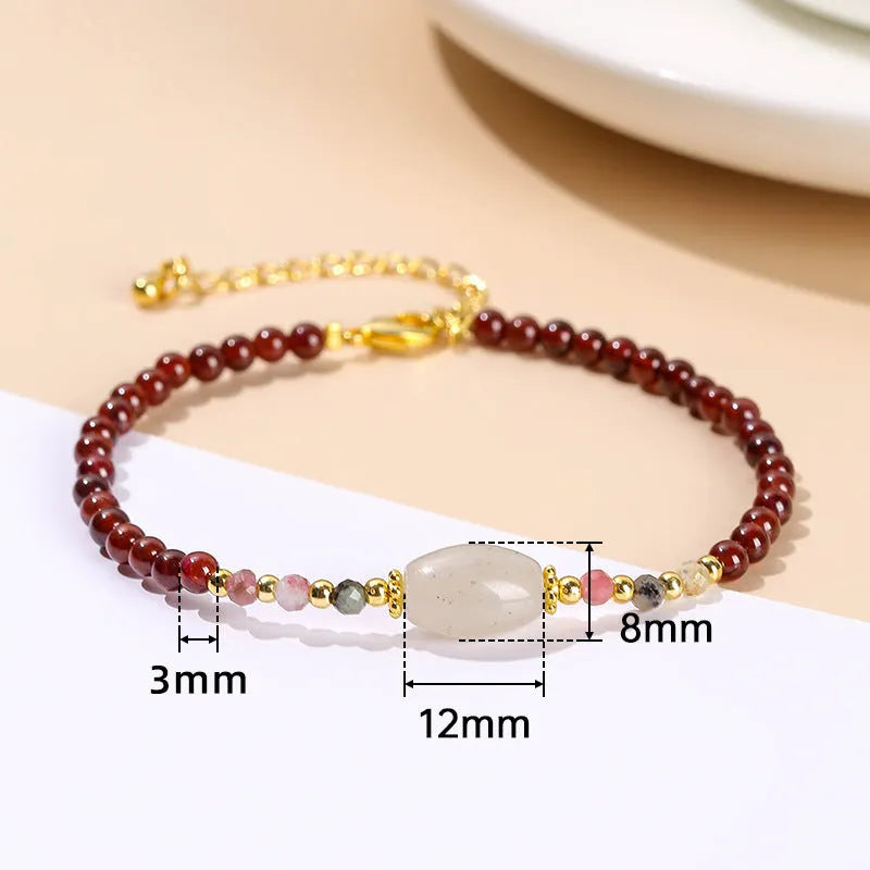 Close-up of a handmade girls' bracelet with crystal, agate and jade beads in a choice of colours and shapes.
