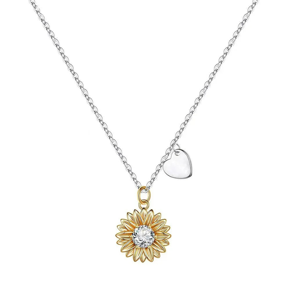 Women's sterling silver sunflower necklace with geometric pendant and adjustable cross chain.