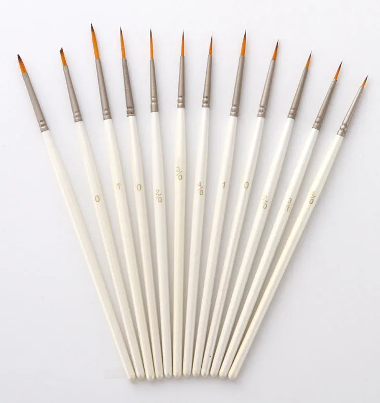 Set of 12 fluorescent pearl white nylon wool hook art brushes in a solid wood pen holder.