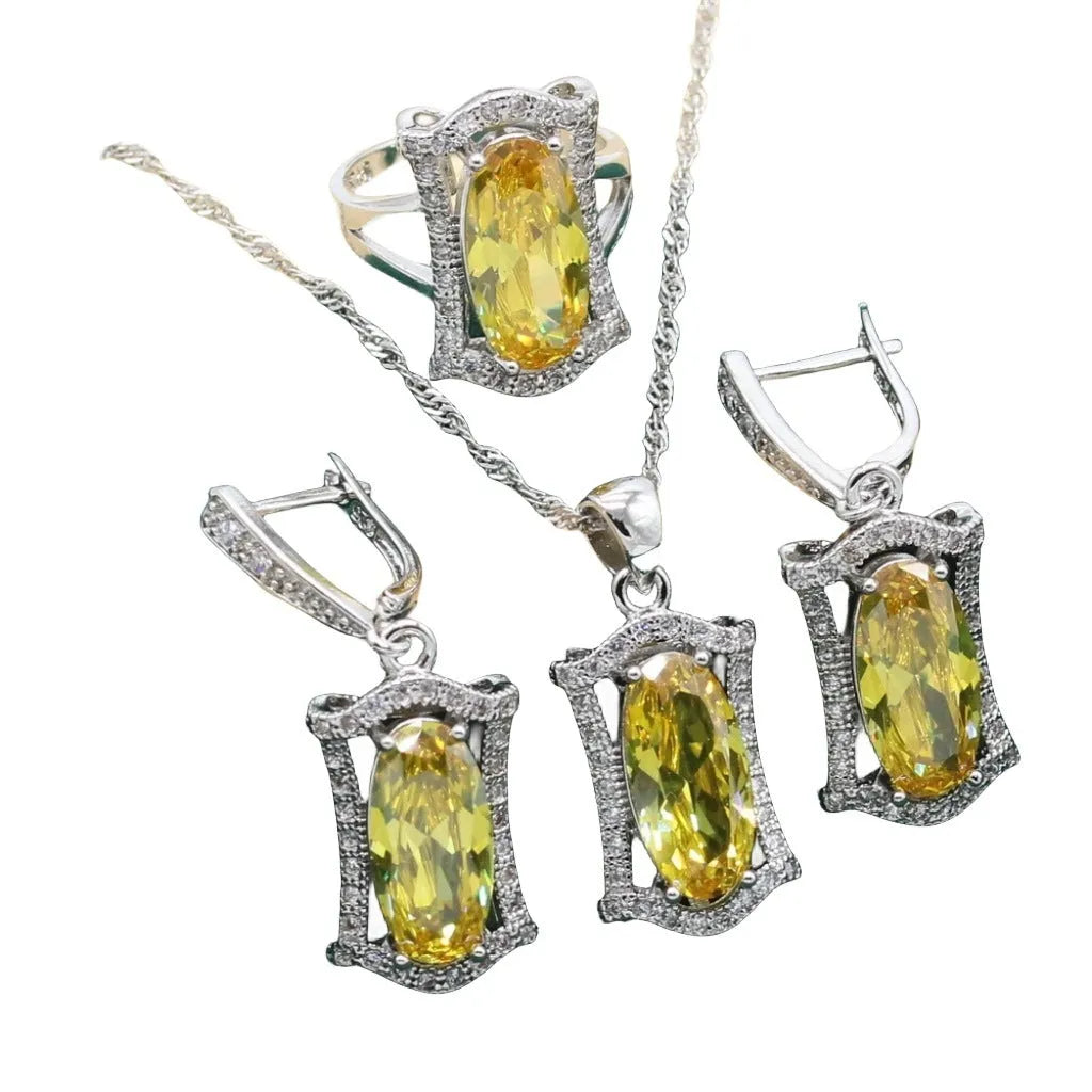 Complete zircon jewellery set with snake bone chain necklace, matching earrings, ring and bracelet in yellow or olive colour