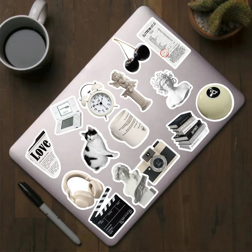 61-piece pack of black and white simple style PVC waterproof stickers for laptops and phones.
