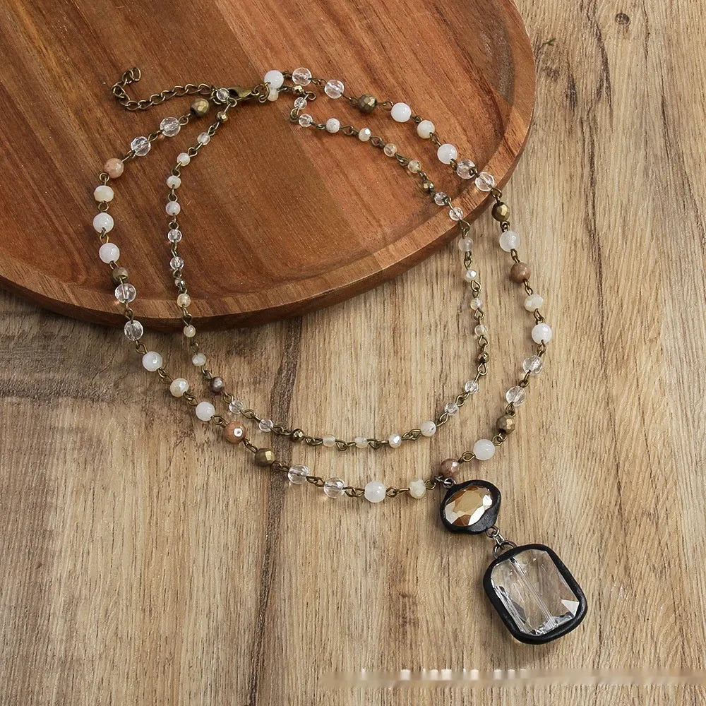 Two-layer tribal necklace with stone and glass pendants on alloy chain, adjustable length