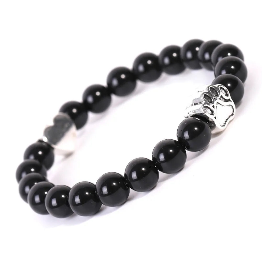 Close-up of a geometric beaded stone bracelet showing texture, style options include Tigereye and Indian Agate.
