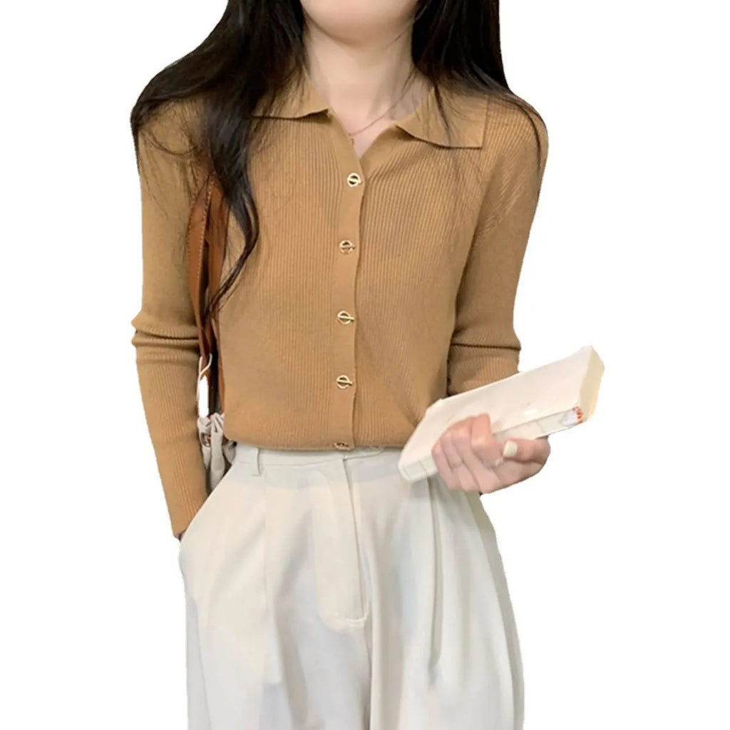 Long-sleeve viscose knit cardigan in loose fit, shown in beige colour on hanger.