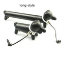 Black dog-shaped touch screen stylus pen shown next to a smartphone on a desk.