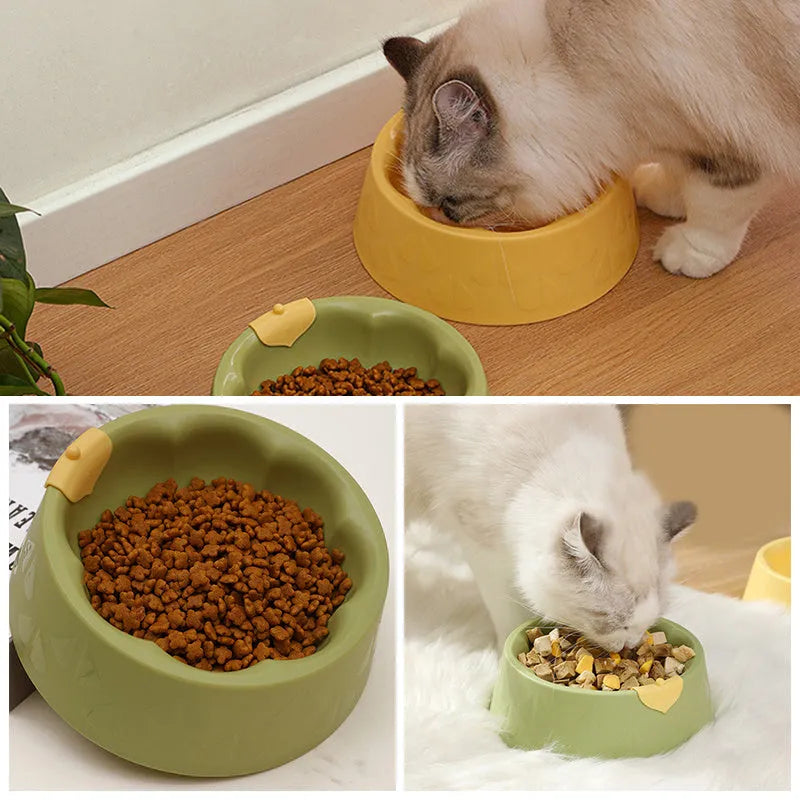 Green flower-shaped plastic pet bowl for cat or small dog food and water.