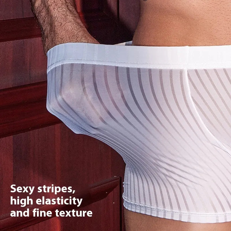 Men's black and white striped nylon boxer briefs laid flat, showing elasticated waistband and leg openings.