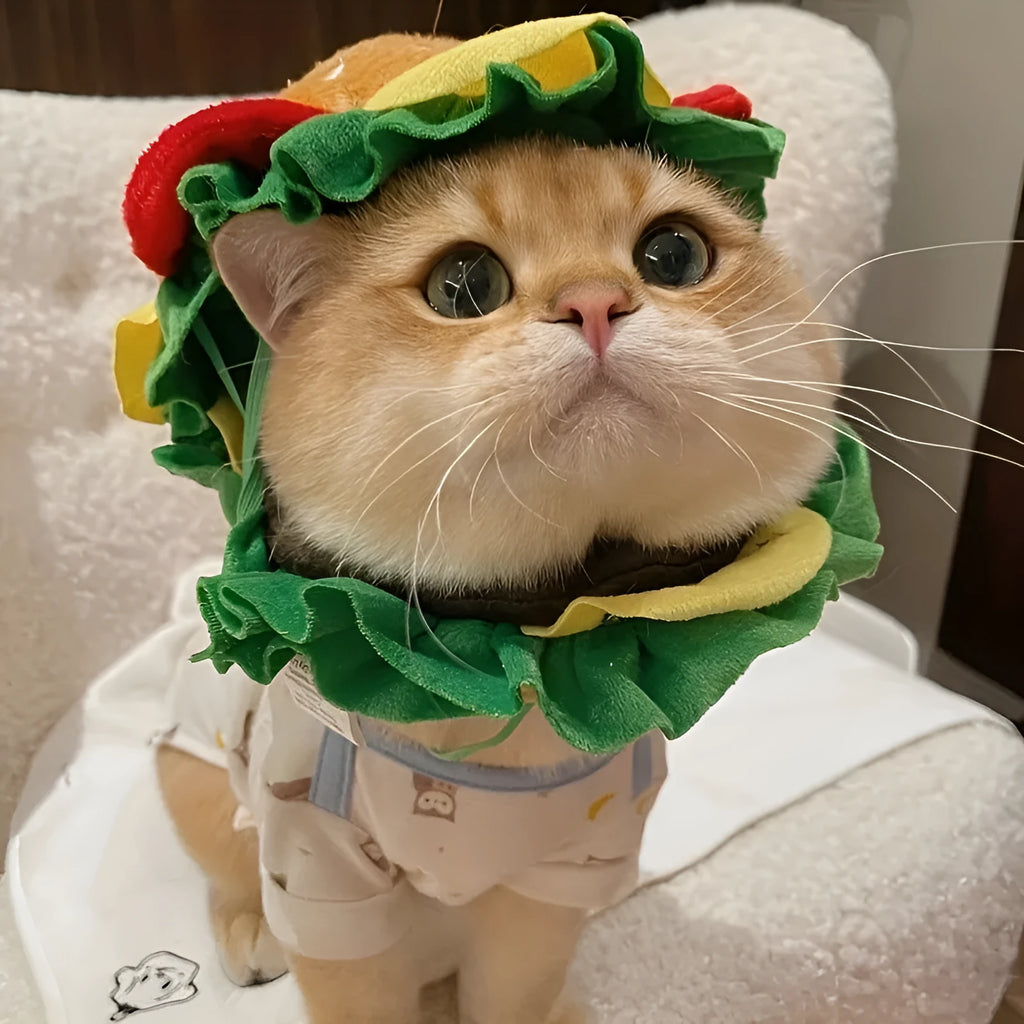 Soft fabric burger-shaped collar for cats on a neutral background, showing lettuce and cheese details.