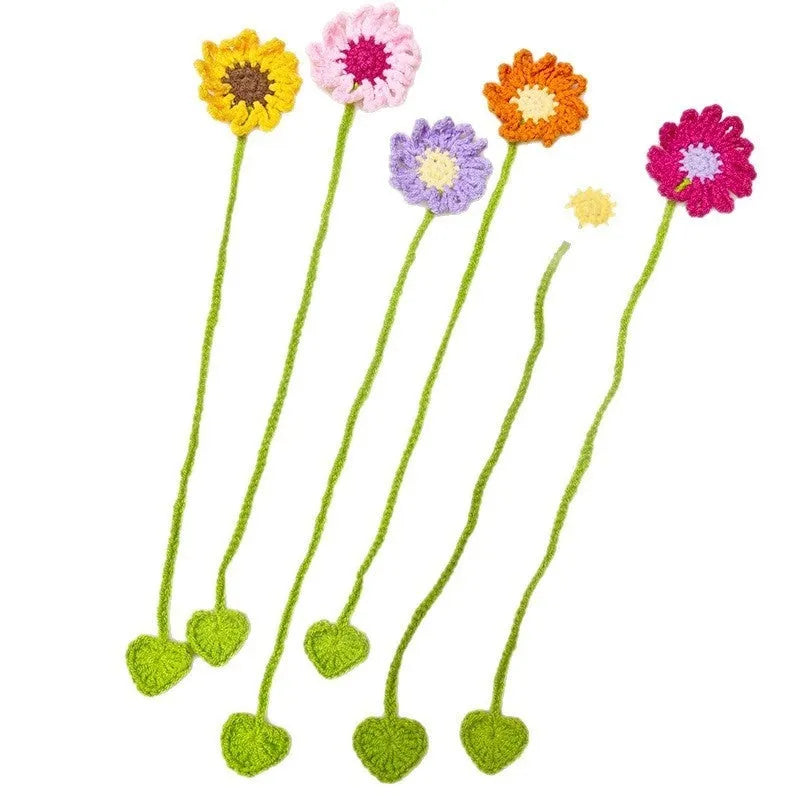 Hand-crocheted wool bookmark with daisy motifs on flexible wire in multiple colour options