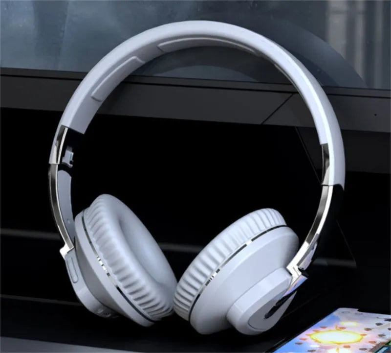 Wireless over-ear headset with Bluetooth connectivity showing AUX jack and TF card slot in multiple colour options
