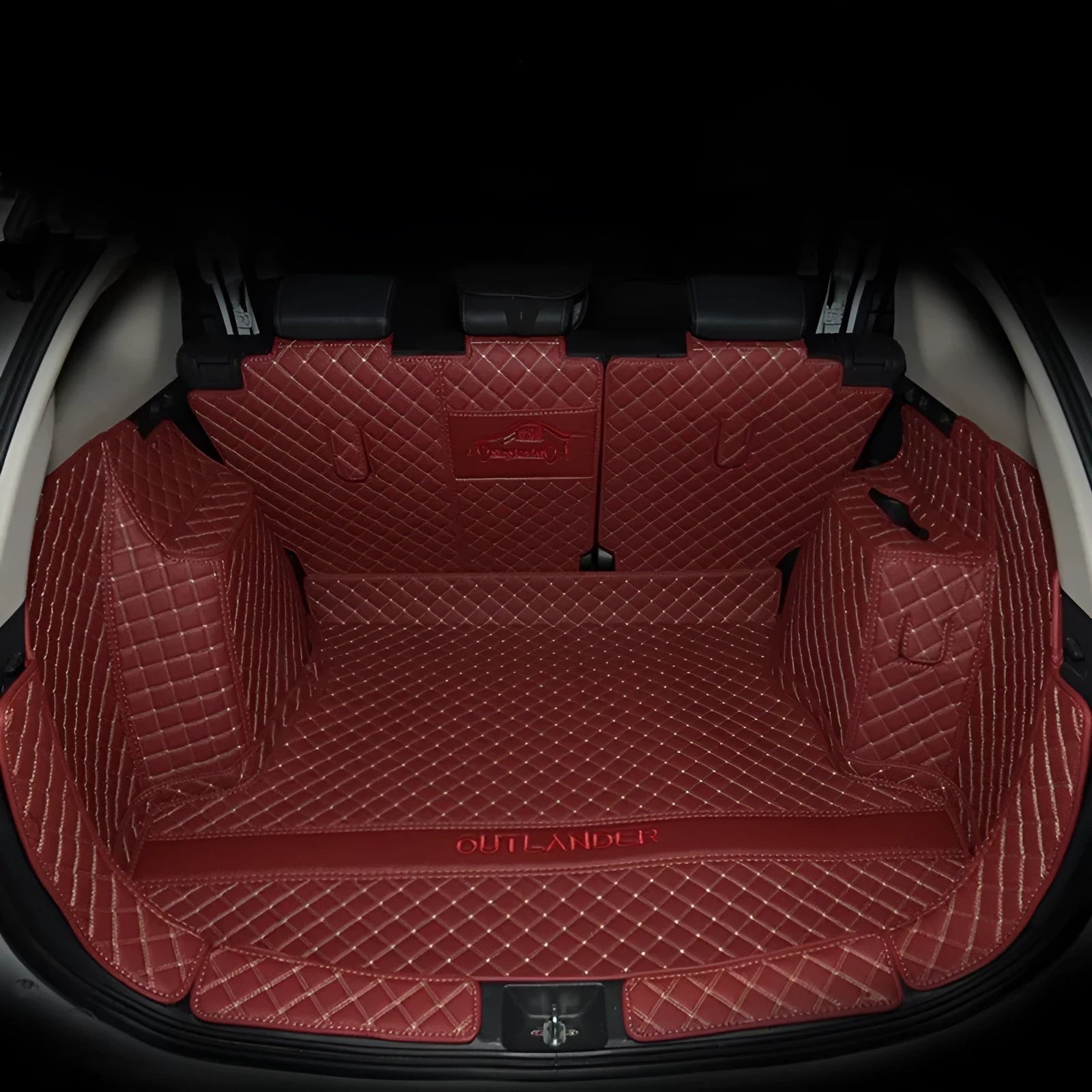 Mitsubishi Outlander boot liner mat with 3D raised edges in a vehicle cargo area.