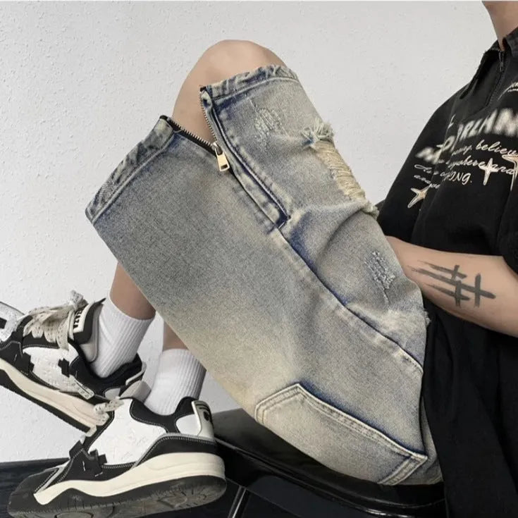Blue retro-style women's denim shorts with wide leg, loose fit, and tattered detailing on a neutral background.