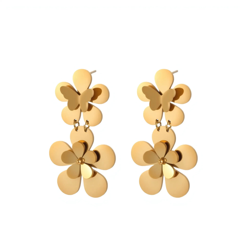 Gold coloured flower butterfly earrings with geometric and zodiac details on stainless steel.