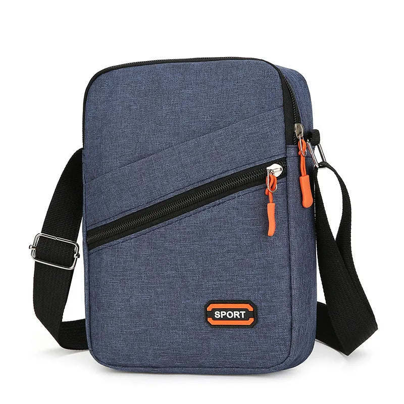 Oxford cloth crossbody commuter bag in solid colour with contrast design