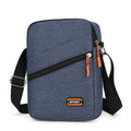 Oxford cloth crossbody commuter bag in solid colour with contrast design