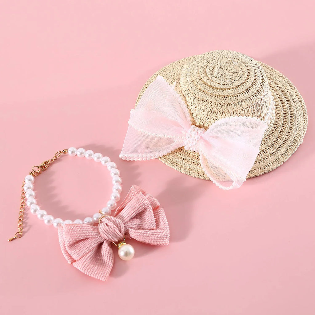Pet cat wearing woven straw hat with pearl bow decoration in monochrome princess style
