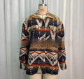 Women's retro Aztec print woolen jacket in army green, shown on a model with a loose fit and long sleeves.