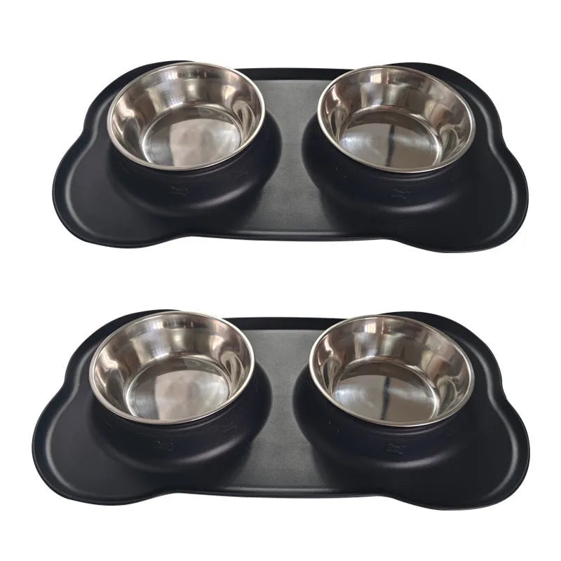 Large silicone dog bowl with a stainless steel inner insert, shown in blue on a floor.