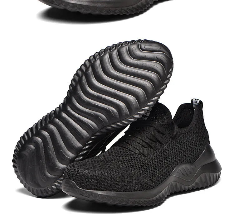 Black low-cut work safety shoes with a steel toe cap and EVA sole for shock protection.