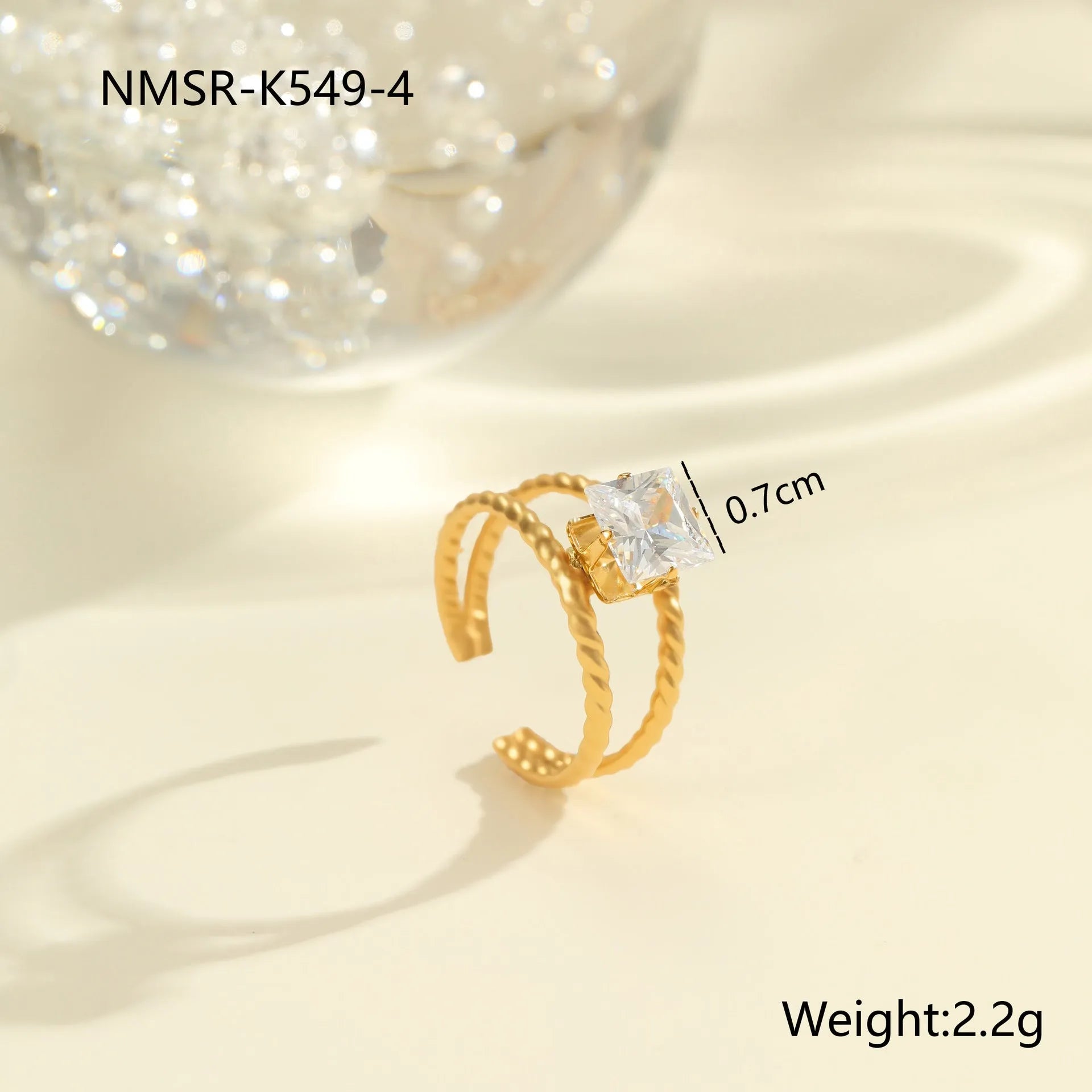Gold electroplated stainless steel ring with zircon geometric design on adjustable open mouth band