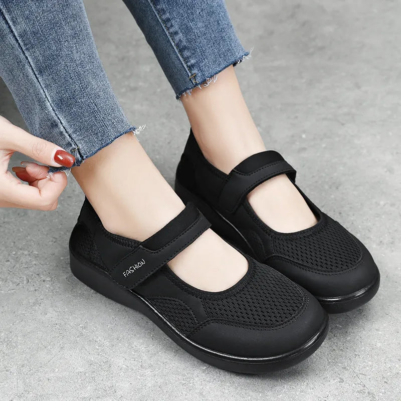 Women's grey mesh casual shoes with Velcro fastening and flat polyurethane sole