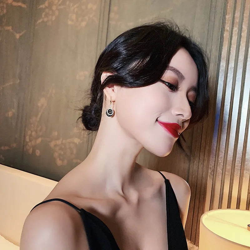 Black retro Hong Kong style geometric round earrings with 3.6cm length alloy construction