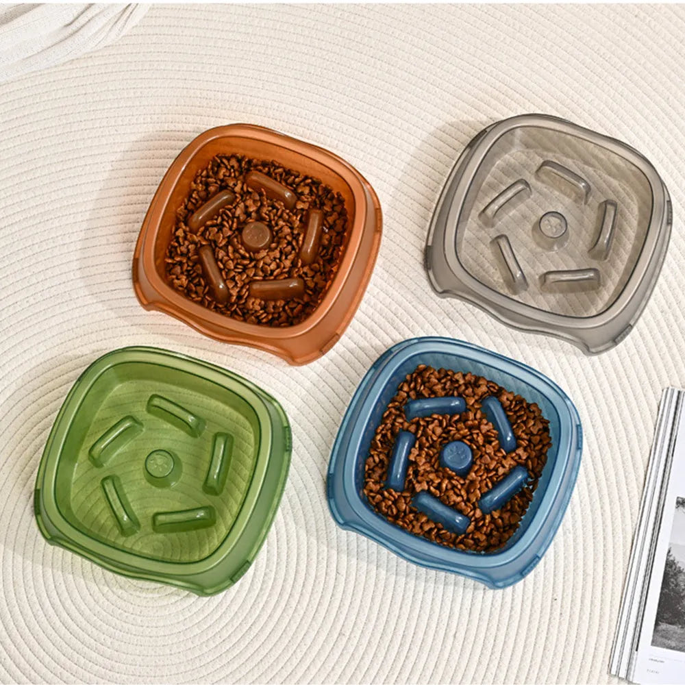 Plastic dog slow feeder bowl in blue, grey, green, or orange with anti-choking maze design
