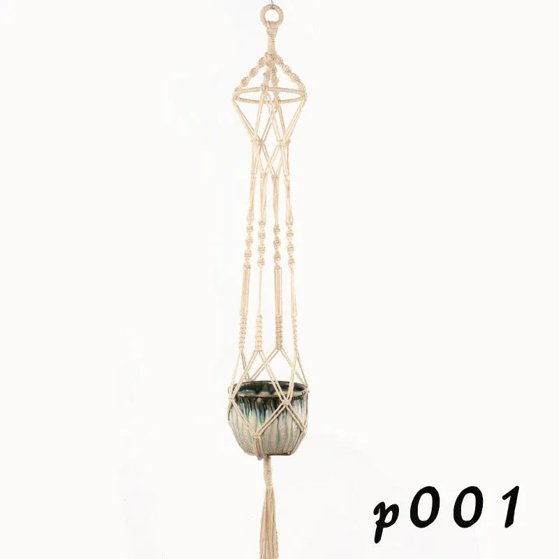 Woven wire cotton rope rustic hanging basket plant holder on a wall.