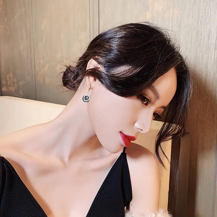 Black retro Hong Kong style geometric round earrings with 3.6cm length alloy construction