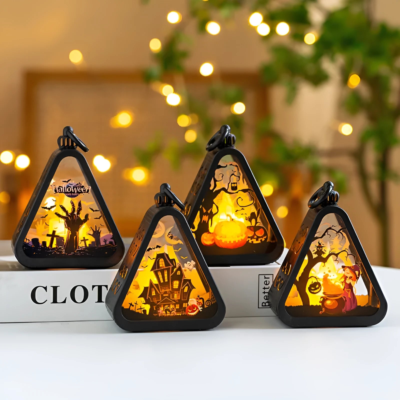 Halloween pumpkin lamp decoration with four theme options on tabletop