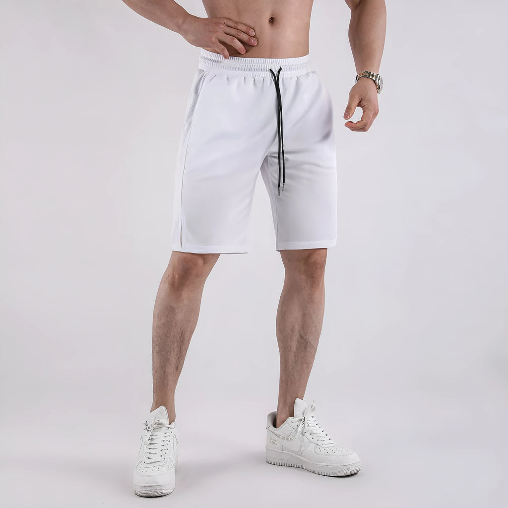 Men's black and white quick-drying loose-fit mesh shorts with elastic waistband.
