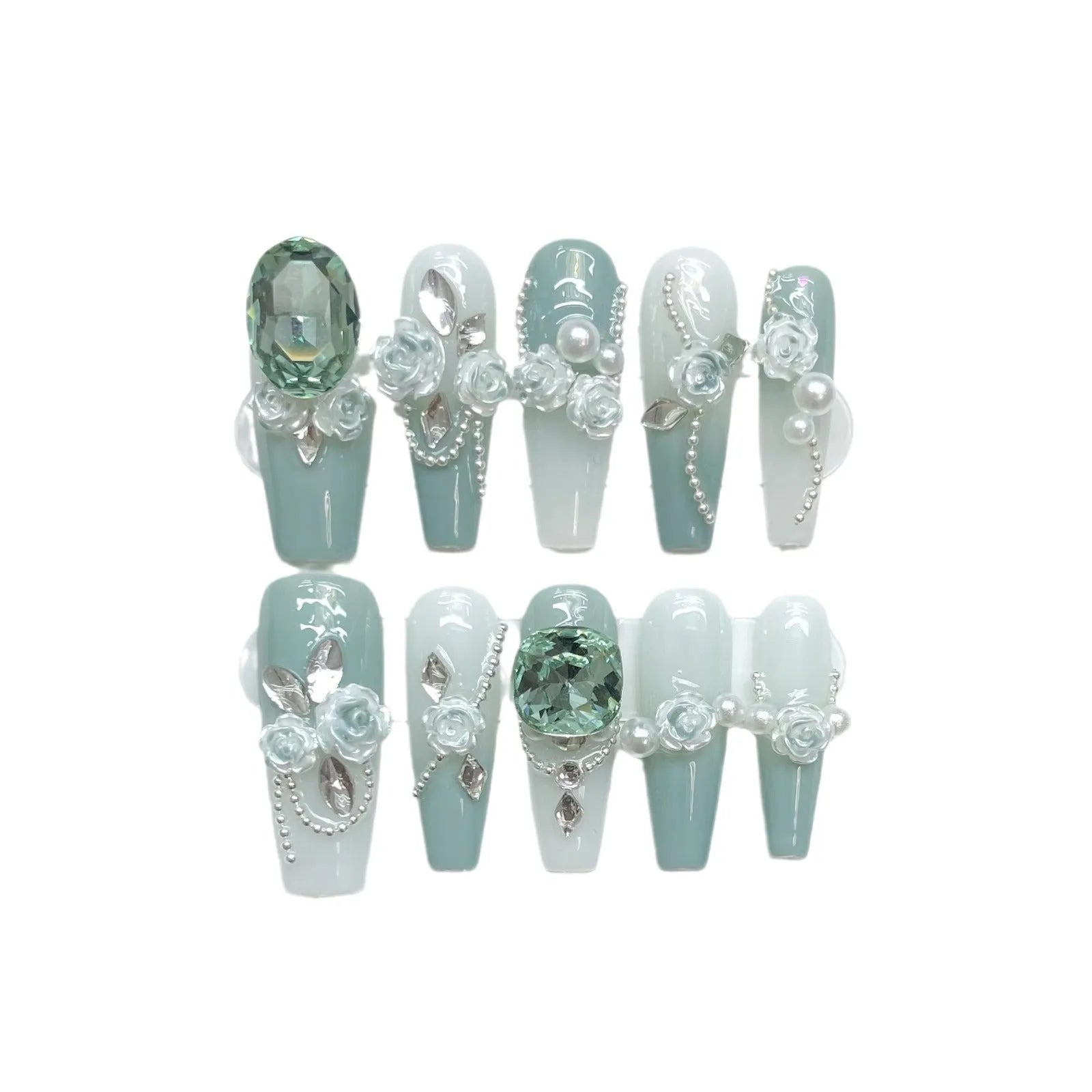 Camellia gradient chain nail art set with diamond, bow and butterfly designs on plastic armour suit