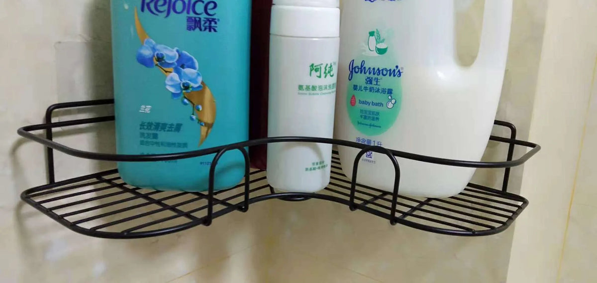Punch-free iron single-layer corner rack for bathroom and kitchen storage in white or black with suction stickers.
