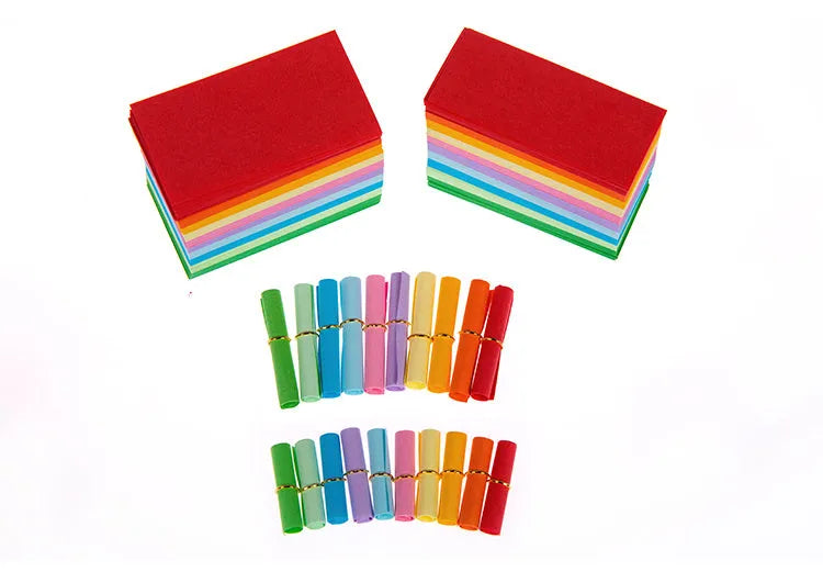 Assorted colour mini paper scrolls with eyelets for drift bottle messages and crafts.
