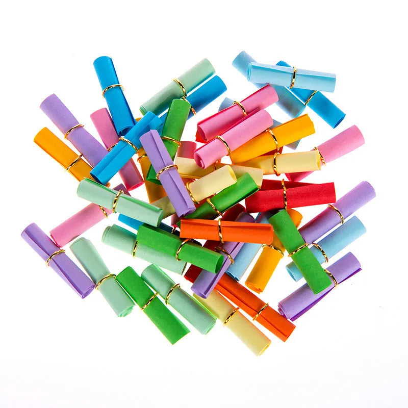 Assorted colour mini paper scrolls with eyelets for drift bottle messages and crafts.