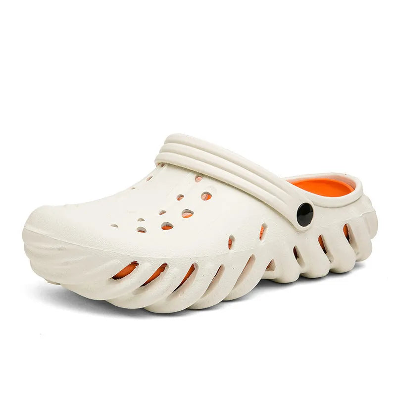 Men's beige EVA slipper sandals with hollow out design and round toe on a non-slip sole.