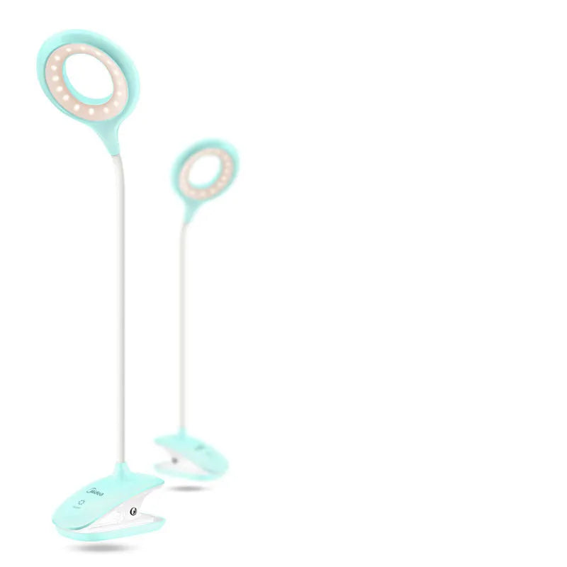 Green USB rechargeable touch control LED table lamp on a wooden desk.