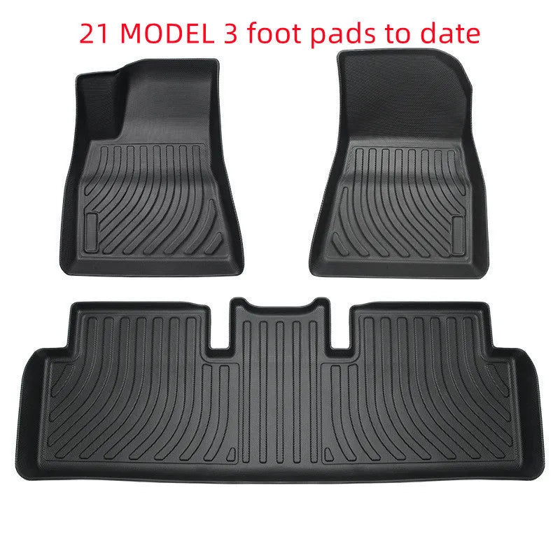 Tesla floor mats made from black rubber with textured TPE footrest section for Model 3, Y, S, and X vehicles