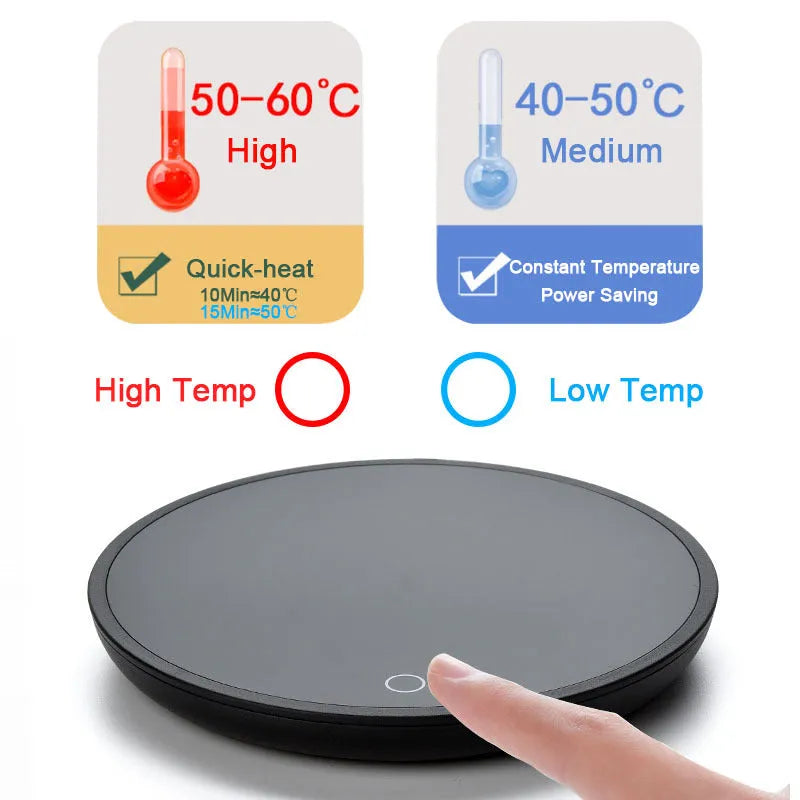 Black electric coffee mug warmer with tempered glass surface and temperature switch on a desk
